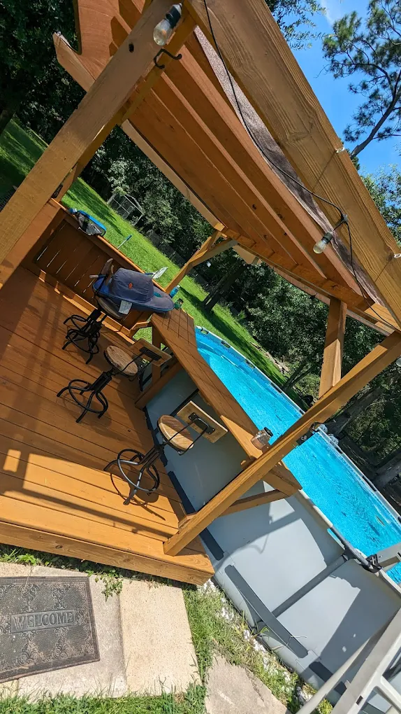Outdoor Pergola & Pool Area by First Shot Construction Orange TX